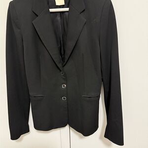 Vertigo Paris Woman’s Black Blazer with 3 button closure . Size Small.